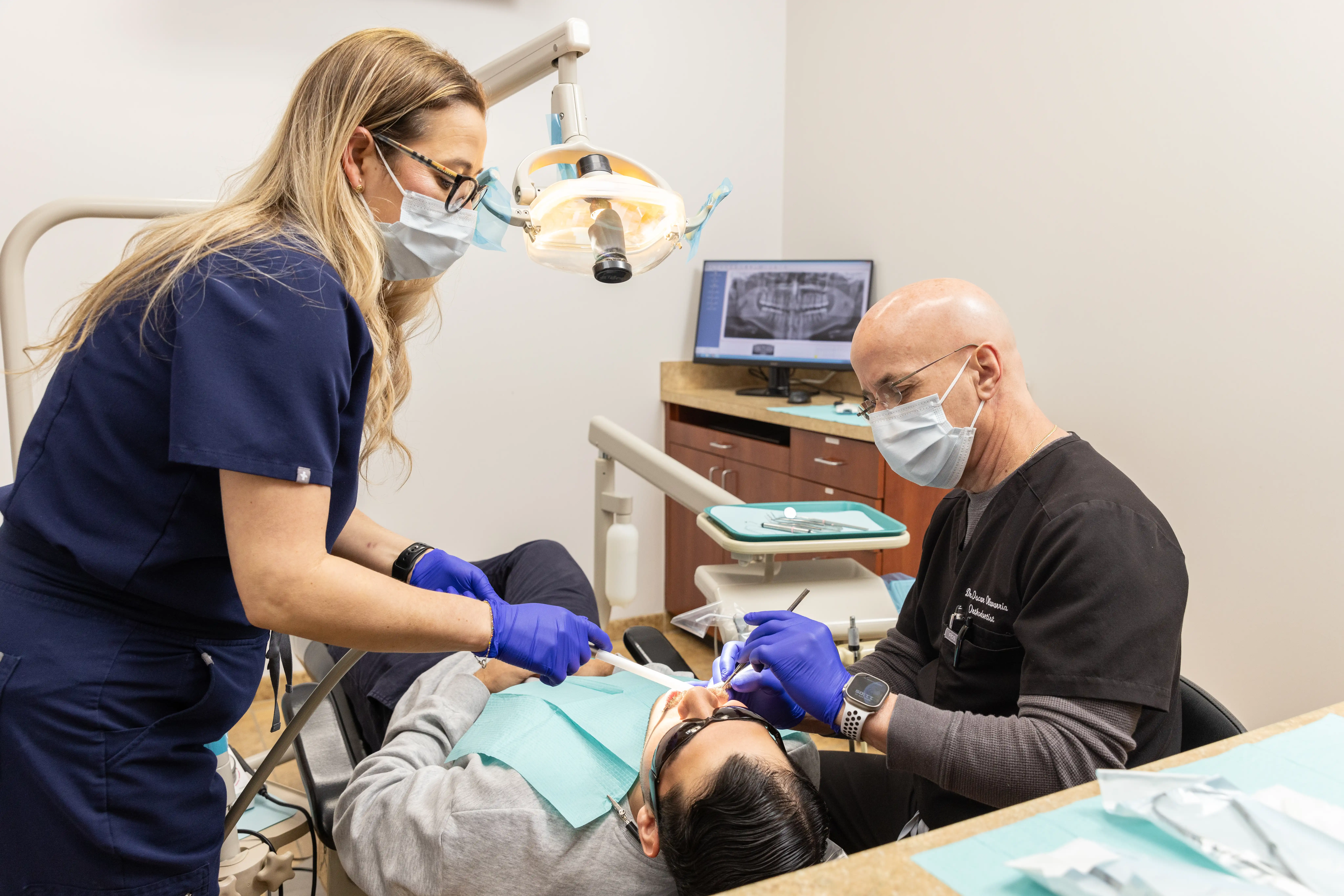 Dentist placing dental implants